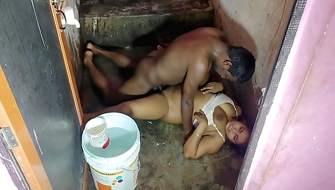 Indian amateur in a white bathrobe is masturbating