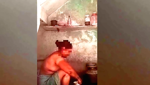 Brunette girl is getting her hair and pussy washed
