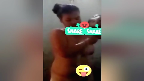 Sexy amateur brunette showing her long thighs in the bath