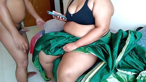 Big boobed brunette with green saree is fucking a guy