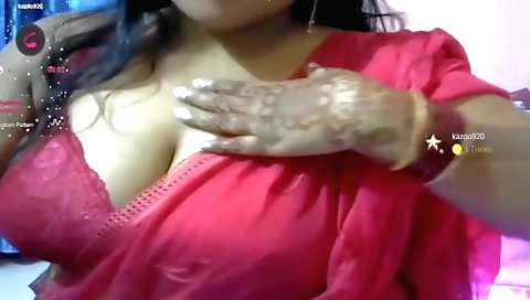 Chubby beauty with big natural tits riding a dildo
