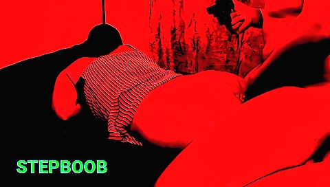 Sexy brunette in red dress and stockings on webcam