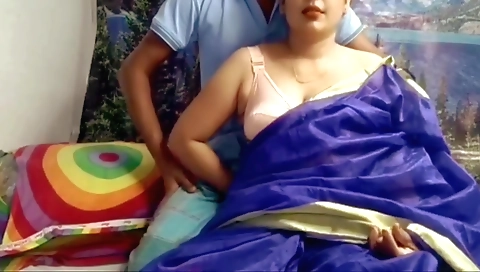 Indian brunette with a hairy pussy is having a sex