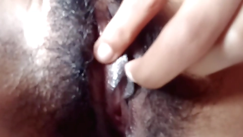Sexy hairy amateur woman is giving a blowjob on web cam