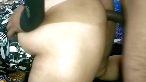 Indian woman with a big ass takes a dildo in her ass