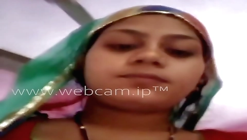 Sexy brunette indian bhabi shows off her ass and her boobs