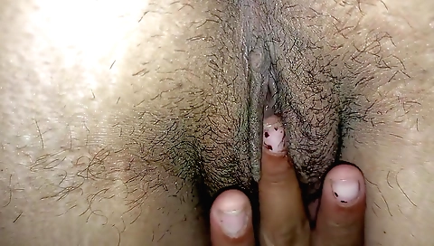 Indian amateur shows her hairy cunt and gives a massage