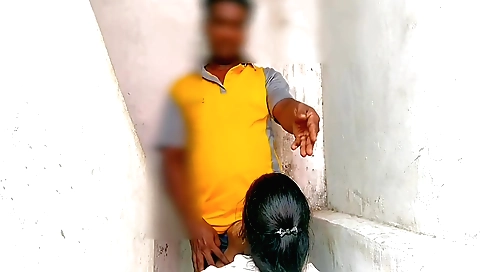 Indian teen 18+ in a black skirt and a white blouse with a sexy ass