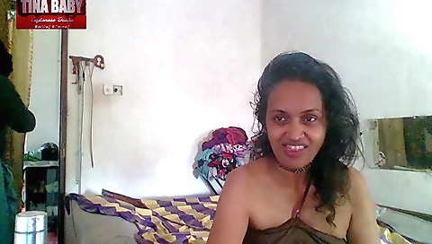 Indian stepmom fucks her stepdaughter in the bedroom
