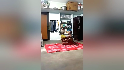 Indian granny with a hidden cam in her sex with a young guy