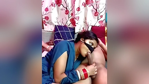 Indian bhabi licking husband's big cock and moaning