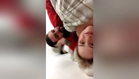 Amateur porn clip of a blonde with a sexy dress being caressed