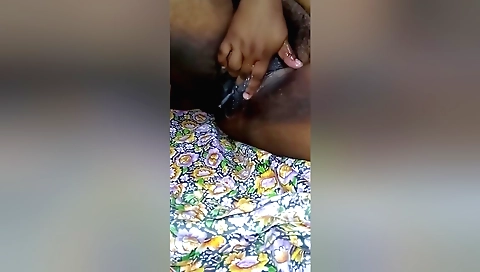 Indian wife fingering her hairy pussy naked in her bedroom
