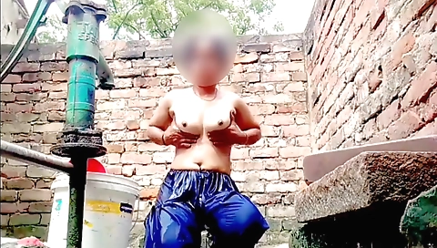 Indian girl with small boobs stretches in the field