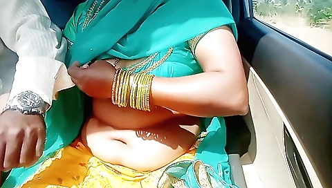 Indian brunette in a car with a guy in the backseat