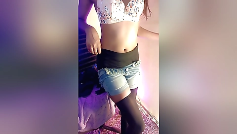 Indian woman in a sexy red bikini in sexy stockings