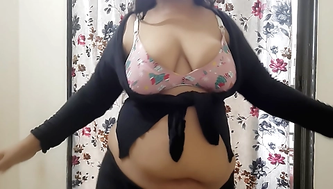 Naked brunette in black dress and blouse doing solo webcam