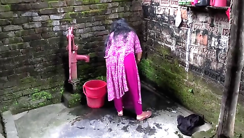 Indian brunette sucking her aunt's dick in bathroom