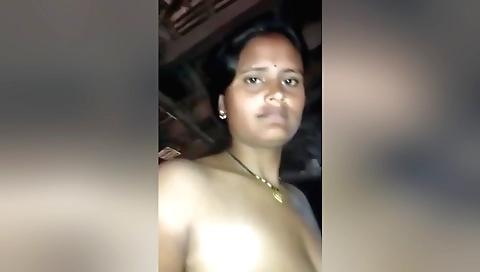 Indian chick is wearing a dress and a blouse in the village