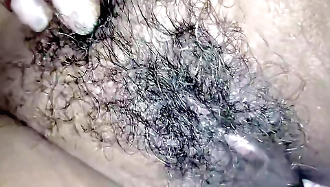 Indian hottie with a hairy pussy makes the husband cum