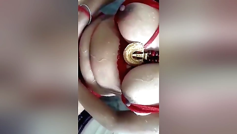 Busty brunette shows off her sexy body and gets naked for a shower