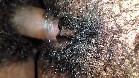 Natural hairy indian babe is taking off her outfit