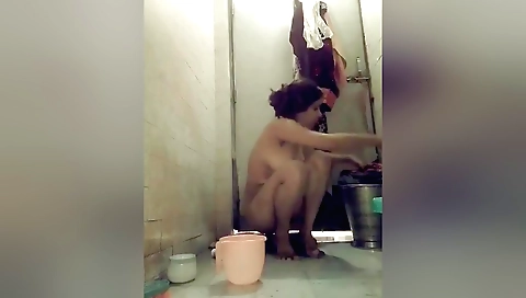Chubby brunette shows off her hairy pussy in the bath
