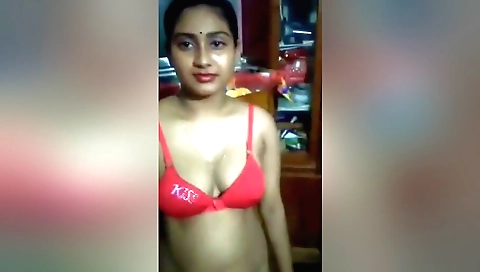 Sexy brunette with a big black hair shows off her body