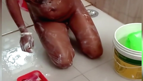 Chubby brunette with a hairy pussy in a shower scene