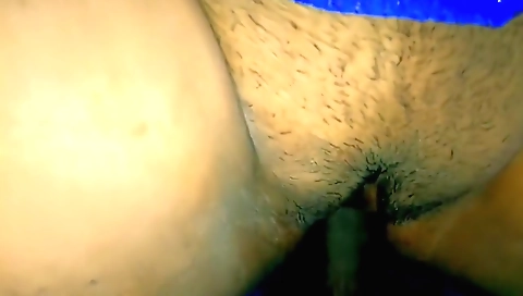 Red-haired woman with a big hairy pussy gets naked and rides on it