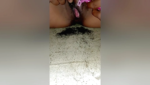 Solo female takes off clothes and shows her hairy pussy